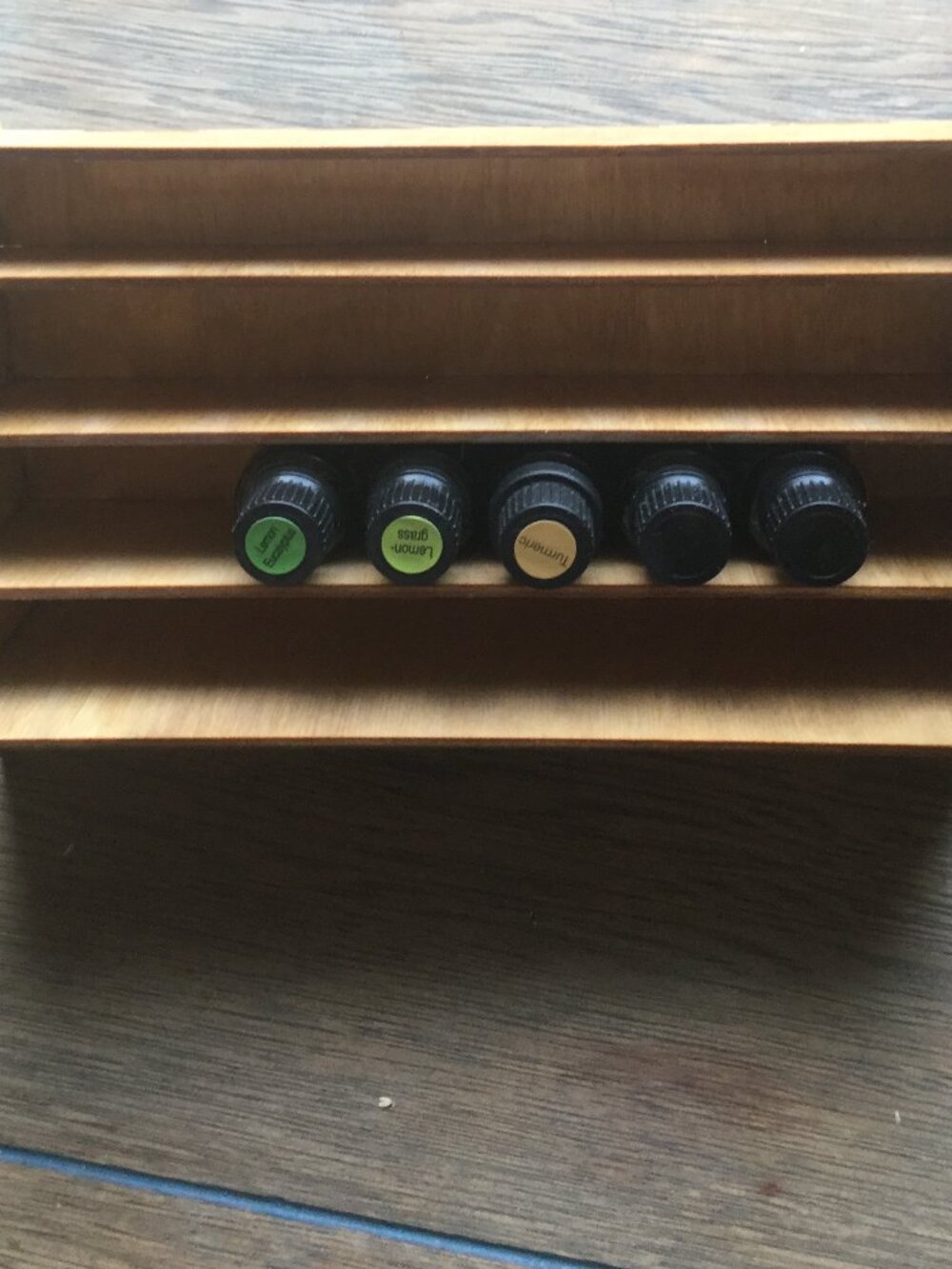 New 5 bottles of doterra oils not opened and wooden shelf for display each 15ml